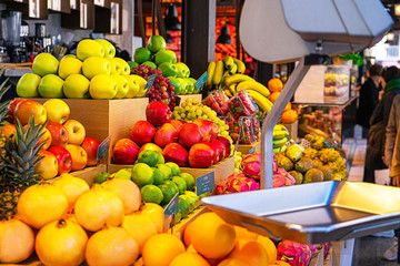 Fresh tropical fruits on the counter in the market.