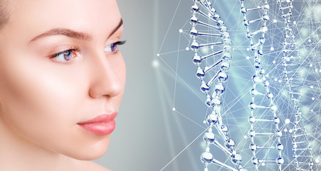 Young woman near digital glass DNA stems.