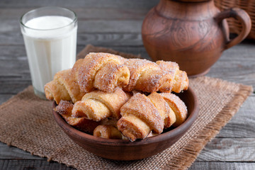 Tasty baked rolled or bagels cookies with sugar