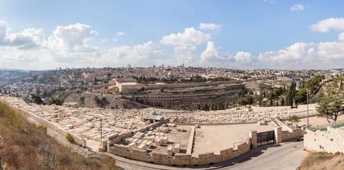 Fototapeta na wymiar Panoramic view of the Jewish cemetery, the Temple Mount, the old and modern city of Jerusalem from Mount Eleon - Mount of Olives in East Jerusalem in Israel