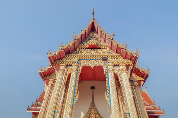 ant's eye view of Gable and buddhist temple with blue sky background, Wat Hua Pong, Ban Pong, Ratchaburi, Thailand.
