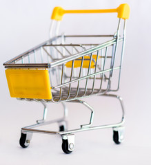 Shopping cart close-up. Isolated. Sales