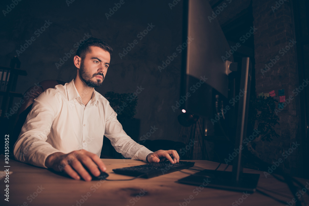 Poster photo of entrepreneur in thoughts looking pensively into screen in search of consistant patterns bro