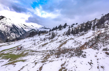 Snowy slopes of Swiss countryside
