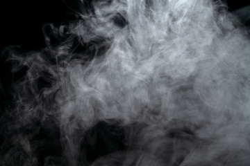 Abstract powder or smoke effect isolated on black background