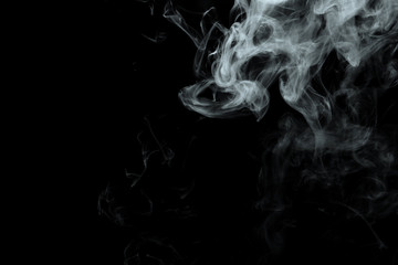 Abstract powder or smoke effect isolated on black background