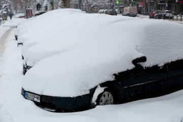Car covered with fresh snow