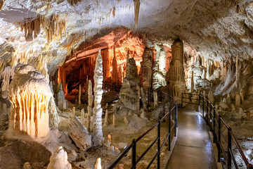Postojna caves the longest cave system in europe can be found in slovenia jama - obrazy, fototapety, plakaty