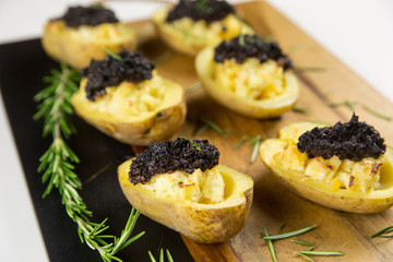 baked potato filled with olive and cream cheese