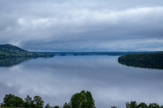 View across a calm and peaceful lake in northern Sweden