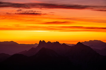The julians alps mountain range during sunrise and sunset with the epic mountains and colour in Slovenia
