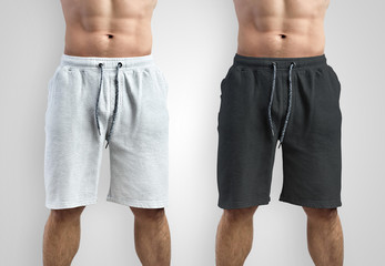 Design mockup white and black shorts on an isolated background.