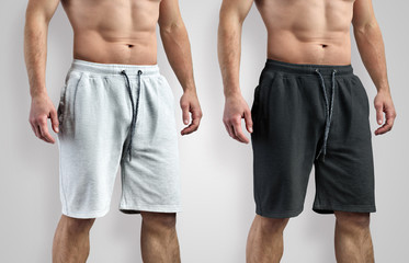 Design template of white and black shorts front and side view for presentation in the store.