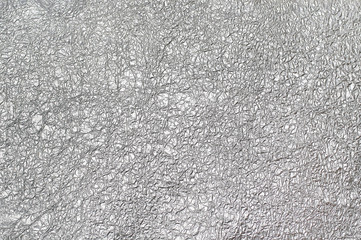 Texture of crumpled silver foil