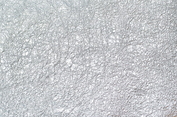 Texture of crumpled silver foil