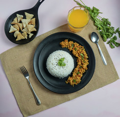 Indian Egg Kurma with rice and Fryums