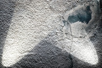 Detailed view at spotlights on an aged concrete wall in high resolution
