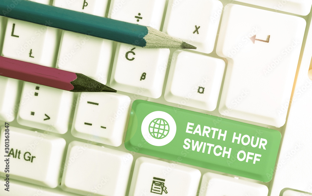 Aufkleber writing note showing earth hour switch off. business concept for the lights out event annual movemen