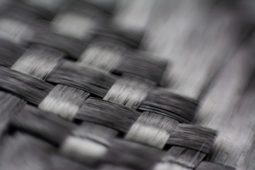 close up macro detail of carbon fiber composite material