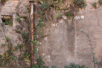 Old metal chimney coming out of the ground