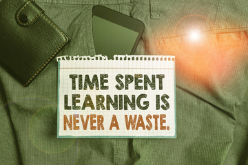Writing note showing Time Spent Learning Is Never A Waste. Business concept for education has no end Keep learning Smartphone device inside trousers front pocket with wallet