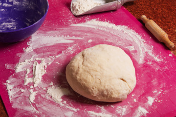 Cooking in the kitchen of the Ukrainian national dish using white flour dough and cottage cheese stuffing and boiled potatoes. Vareniks.