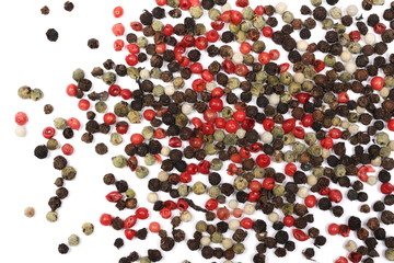 Colorful pepper pile isolated on white background, top view