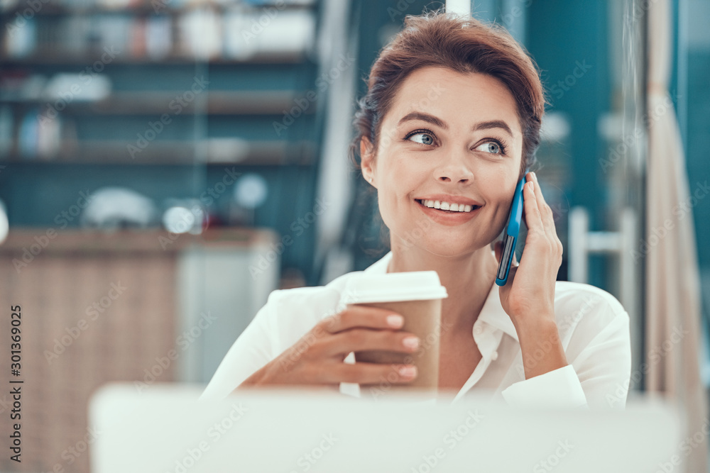 Wall mural Finding time for important phone call stock photo