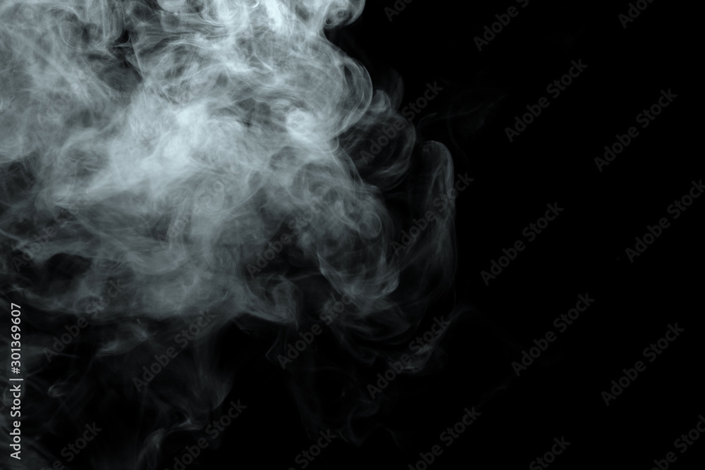 Wall mural abstract powder or smoke effect isolated on black background