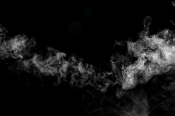 Abstract powder or smoke isolated on black background