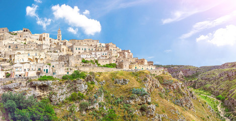 Fototapeta na wymiar Matera view of historical centre Sasso Caveoso of old ancient town Sassi di Matera with rock cave houses, European Capital of Culture, UNESCO World Heritage Site, Basilicata, Southern Italy