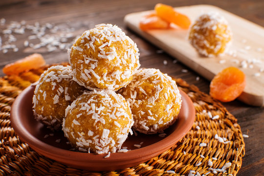 Protein balls with apricots and coconuts Apricot Energy balls, selective focus
