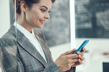 Gorgeous woman with personal mobile phone stock photo