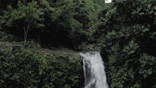 Waterfall in Bali Island tropical mountains 4K Drone flight