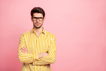 Photo of amazing business guy looking strictly on colleagues crossing hands blaming for late work...