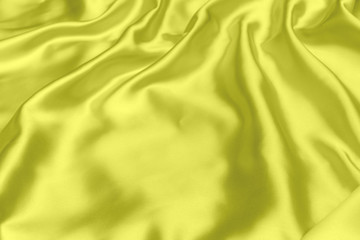 Fototapeta premium Yellow satin fabric texture soft background