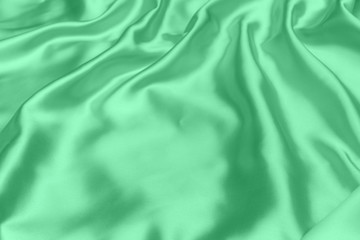 green satin fabric texture soft background
