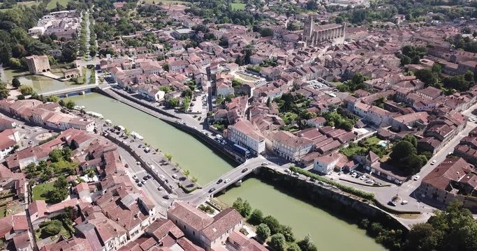 Panoramic aerial view of Condom city on Baise river on sunny summer day, Gers, France