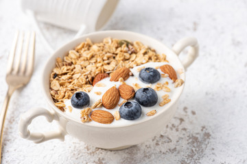 Granola, oatmeal with almond and berry food background