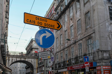 Lisbon, Portugal, October 12, 2019: The facade of the traditional buildings with large glass doors and windows and the iron balcony in the city of Lisbon in Portugal.