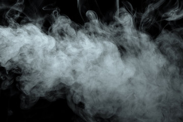Abstract powder or smoke effect isolated on black background