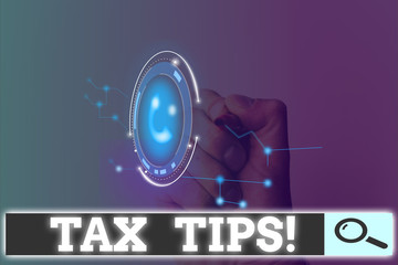 Writing note showing Tax Tips. Business concept for compulsory contribution to state revenue levied by government