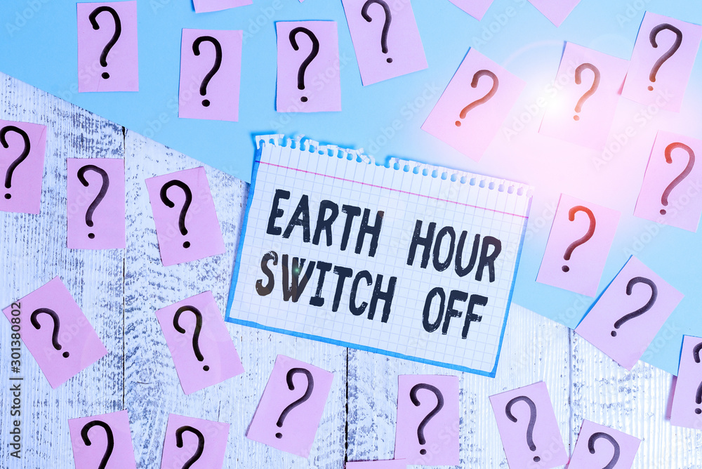 Aufkleber writing note showing earth hour switch off. business concept for the lights out event annual movemen