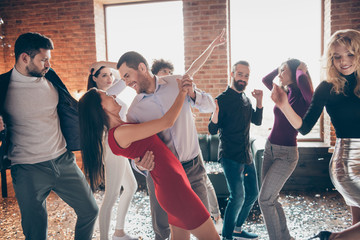 Photo of cheerful positive nice cute couple of people dancing waltz surrounded by their friends...