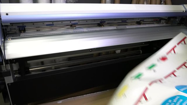Wide-format inkjet printer in action 