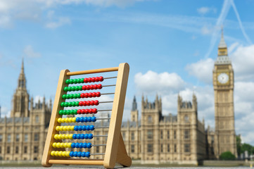 Abacus representing election votes for British political parties in front of the Houses of...