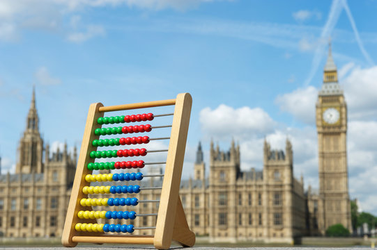 Abacus Representing Election Votes For British Political Parties In Front Of The Houses Of Parliament In London, UK