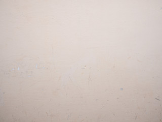dirty white cement rendered wall