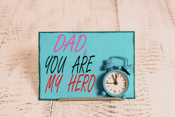 Conceptual hand writing showing Dad You Are My Hero. Concept meaning Admiration for your father...
