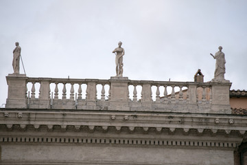 statues on the palace in rome italy